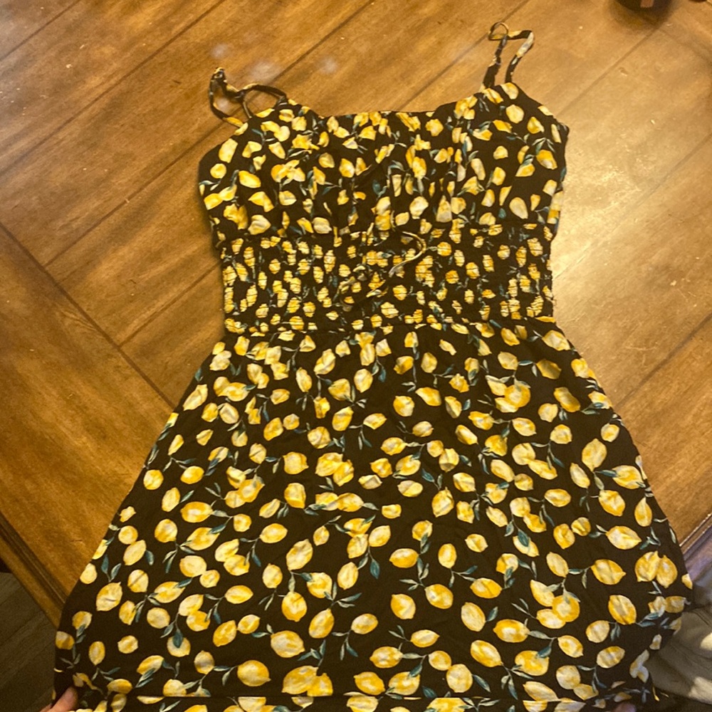 Lemon dress. Size large. Only warn once.  smoke free house